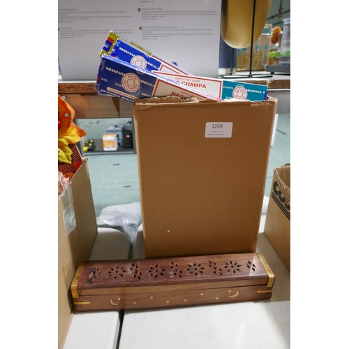 3269 - Large assortment of incense & wooden holder *This lot is subject to vat