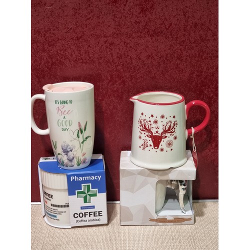 3149 - Assorted mugs and a ceramic jug * This lot is subject to VAT