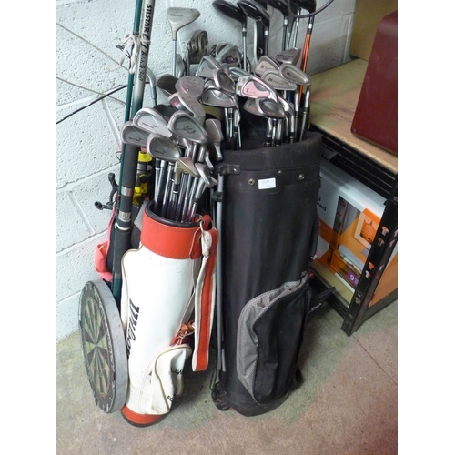 2170 - 4 Sets of golf clubs, a dartboard, a hockey stick and a fishing rod