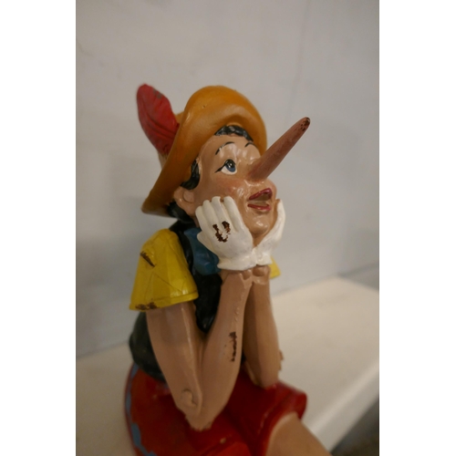 1316 - A sitting Pinocchio figure (RM5410)