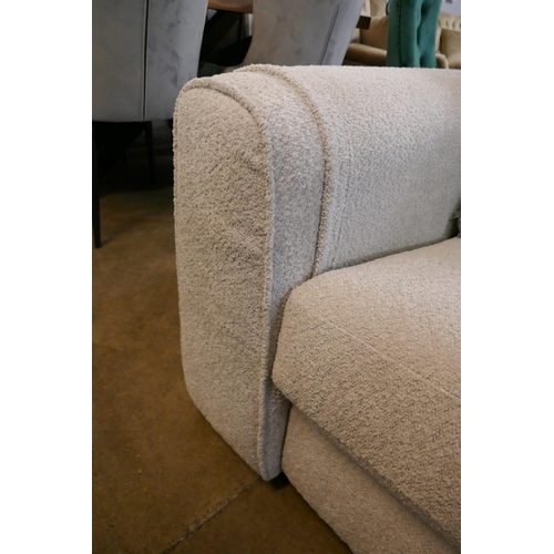 1368 - An ivory upholstered three seater sofa RRP £1099