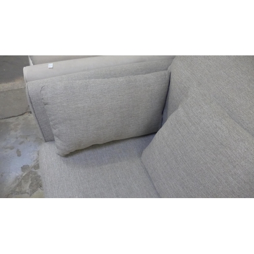 1399 - A mink upholstered three seater sofa