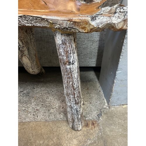 1401 - A rustic hardwood bench