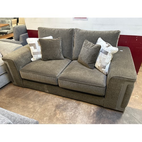 1408 - A dark mink velvet two seater sofa with steel trim RRP £2699