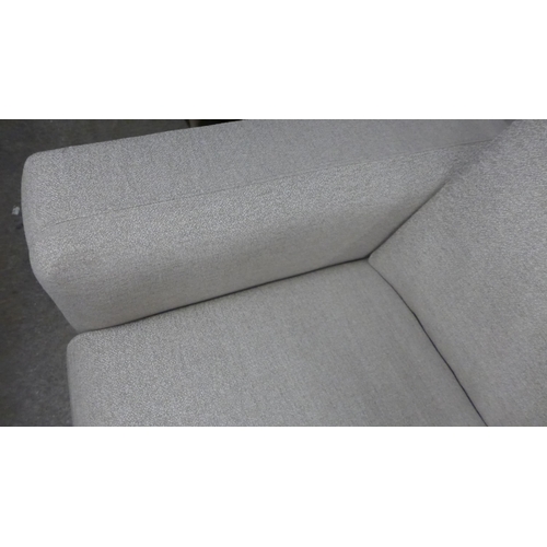 1438 - A sandstone weave L shaped sofa