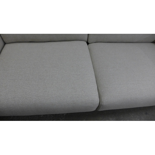 1440 - A sandstone weave four seater sofa