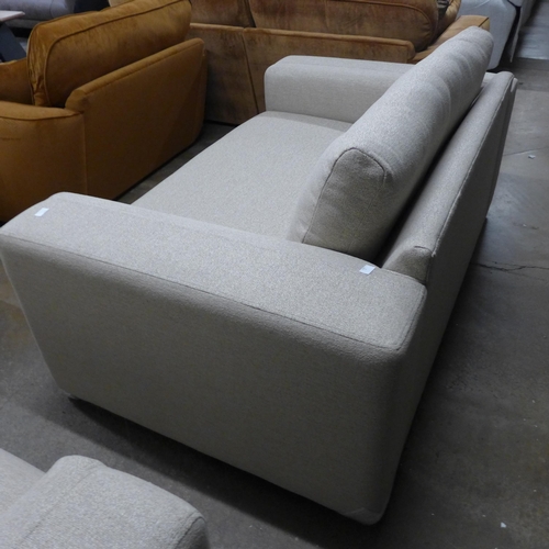 1441 - A sandstone weave two seater sofa