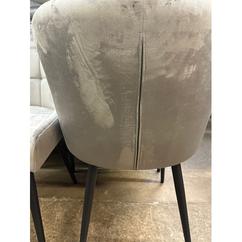 1445 - A set of four Kos grey velvet dining chairs * This lot is subject to VAT