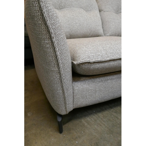 1490 - An oatmeal upholstered electric reclining two seater sofa