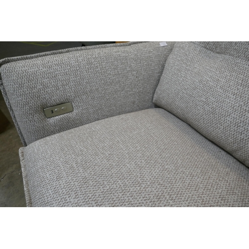 1490 - An oatmeal upholstered electric reclining two seater sofa