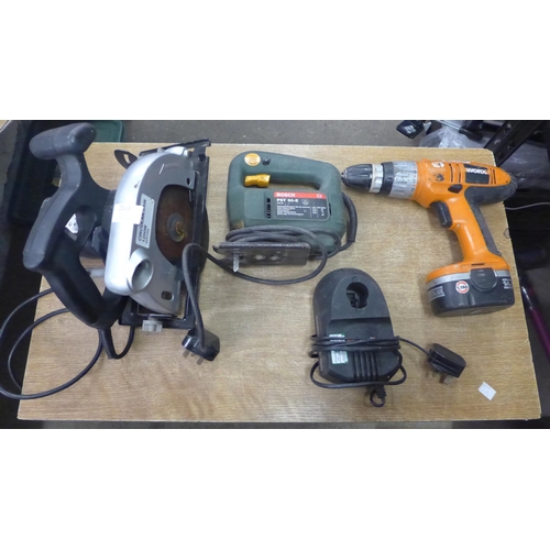 A selection of power tools including a WorX cordless hammer drill