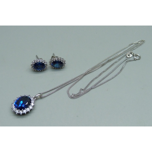 1001 - A 925 silver and CZ cluster pendant on a silver chain with matching earrings