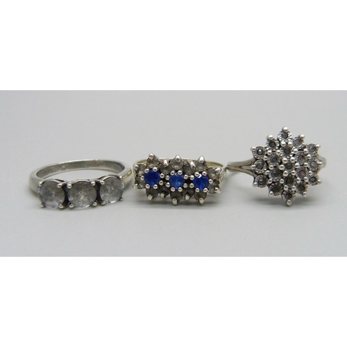 1007 - Three silver stone set rings, 2x N and P, cluster set with small diamonds