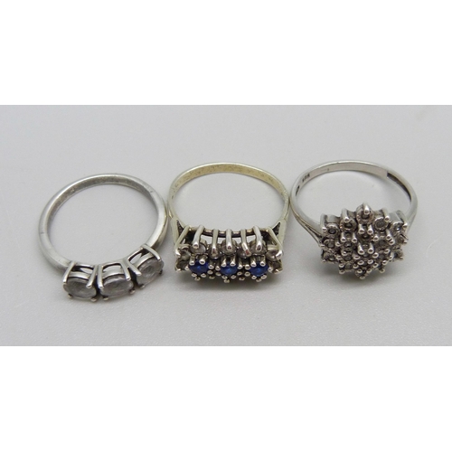 1007 - Three silver stone set rings, 2x N and P, cluster set with small diamonds