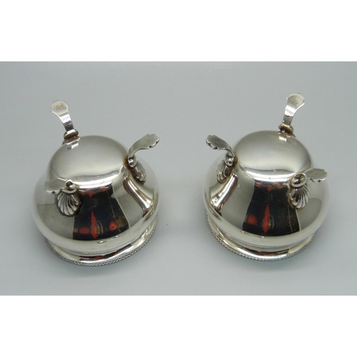 1014 - A pair of silver salts and a pair of silver salt spoons, 65g