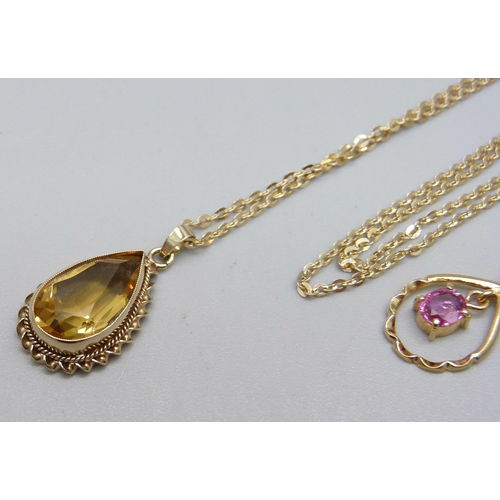 1016 - A 9ct gold and citrine set pendant on an 8ct gold 333 chain, 2.5g, and a 14ct gold pendant marked 58... 