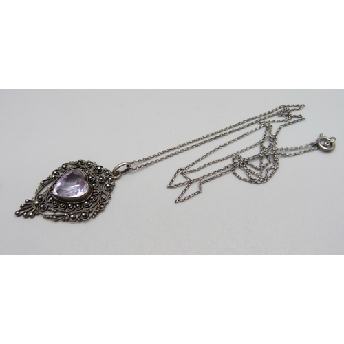 1031 - An 800 silver and stone set pendant and chain