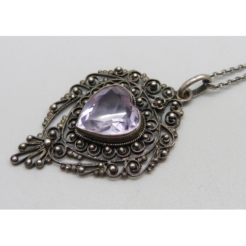 1031 - An 800 silver and stone set pendant and chain