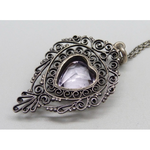 1031 - An 800 silver and stone set pendant and chain