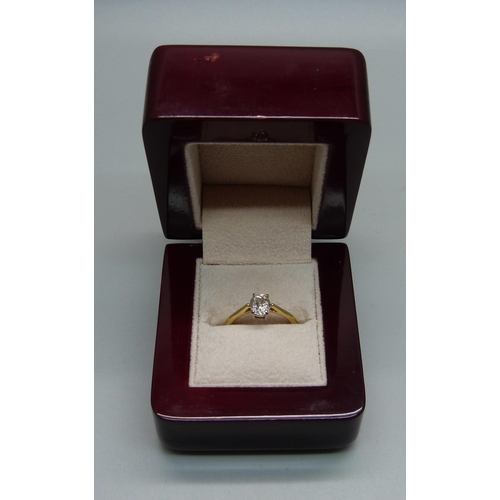 1039 - An 18ct gold and diamond ring, 0.82ct oval diamond, 2.4g, J