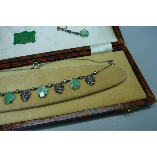 1045 - An Art Deco silver necklace and drop earrings, boxed