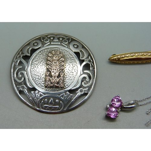 1047 - A 9ct white gold and pink gemstone pendant on a fine 9ct gold chain, 1.7g, a 9ct gold bar brooch, 0.... 