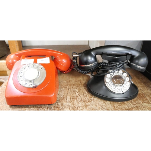 1056 - A red GPO telephone one other **PLEASE NOTE THIS LOT IS NOT ELIGIBLE FOR POSTING AND PACKING**