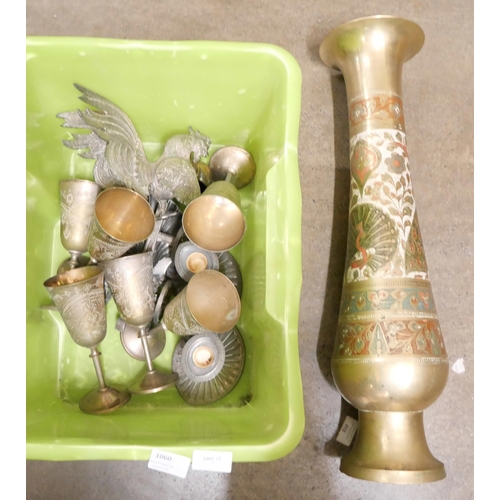 1060 - A Middle Eastern large brass vase, six brass goblets, a pair of silver plated candlesticks, etc. **P... 