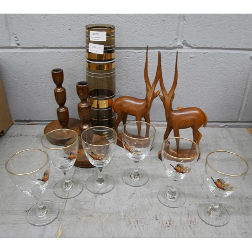 1073 - Six game bird drinking glasses, a retro glass vase, a pair of oak candlesticks and two carved figure... 