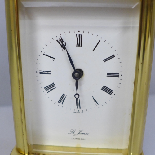 631 - A brass and four glass sided carriage clock, St. James, London