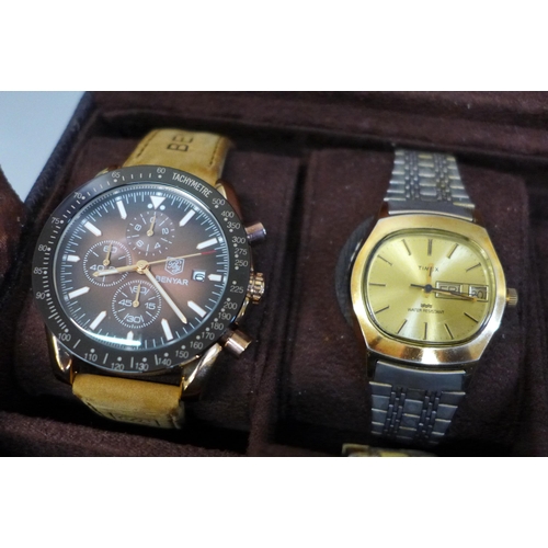 638 - Five wristwatches including Timex, in a watch display box