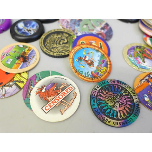 645 - A collection of Pogs and Lego Technic throwing disks