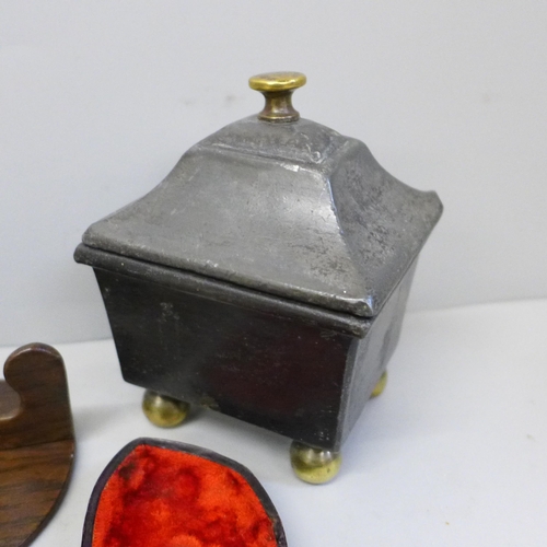 646 - A Georgian/early Victorian lead and brass ball foot and finial sarcophagus tobacco box, a crested pi... 