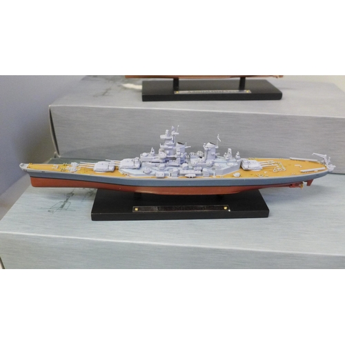 653 - Four Atlas Editions DeAgostini model boats, boxed and a collection of ship cards with photographs an... 