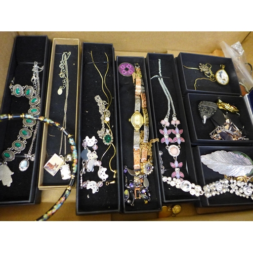 654 - A box of costume jewellery, some boxed