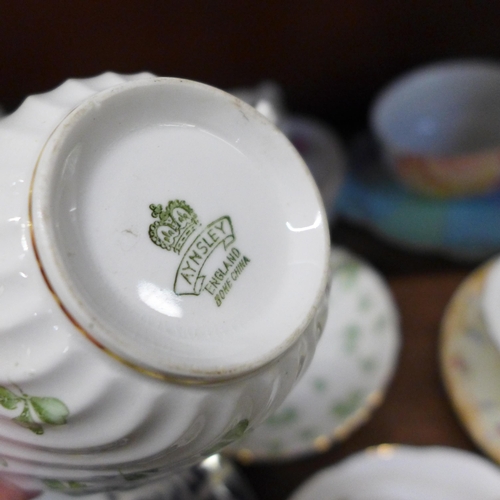 658 - A collection of tea cups and saucers including Royal Crown Derby Unfinished pattern, Royal Worcester... 