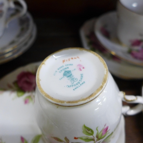 658 - A collection of tea cups and saucers including Royal Crown Derby Unfinished pattern, Royal Worcester... 