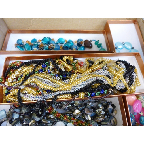 664 - Assorted glass and mother of pearl necklaces and assorted beaded glass chains