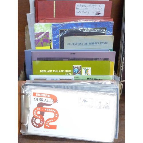 676 - Stamps; a box of stamp and cover albums, etc.