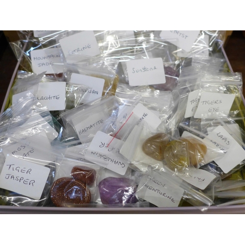 677 - A collection of mineral samples; amethyst, amazonite, citrine, smoky quartz, kyanite, etc., and a co... 