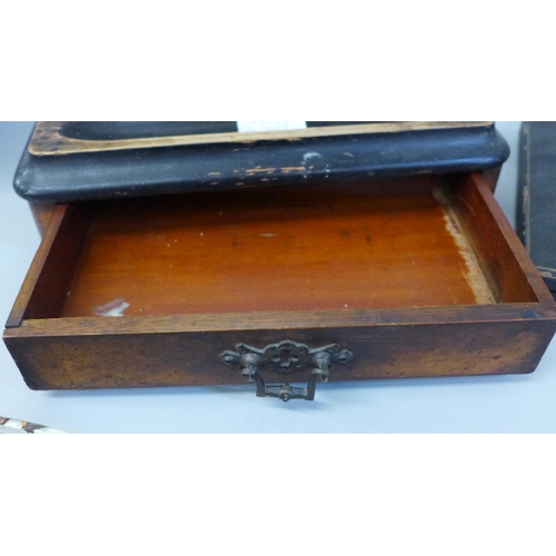 685 - An Edwardian pen stand with double inkwell and a cased set of silver handled pistol grip knives, one... 