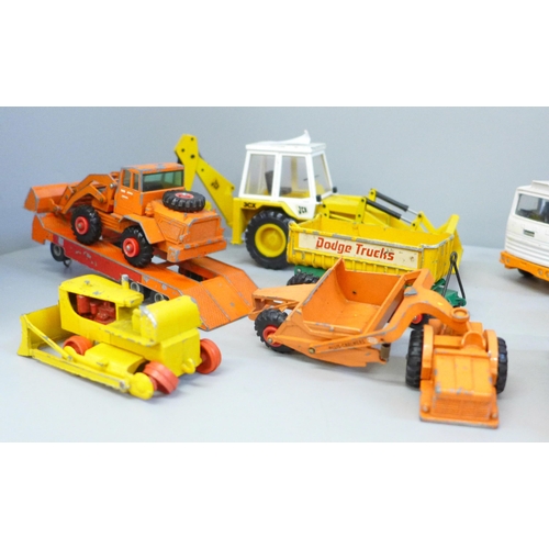 687 - Die-cast model vehicles including two Dinky Leyland Octopus, Corgi Ford Truck and NZG JCB