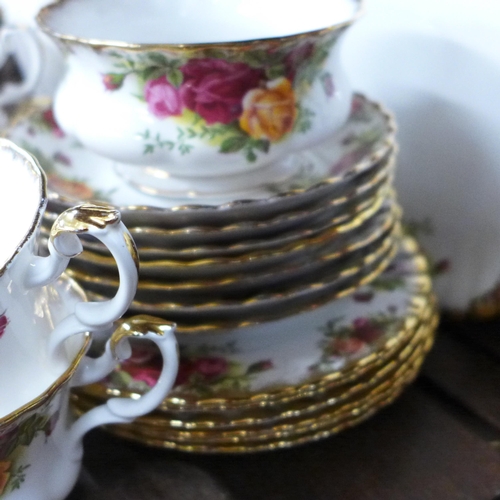 688 - Royal Albert Old Country Roses; seven cups and saucers, five tea plates, bread and butter plate, cre... 