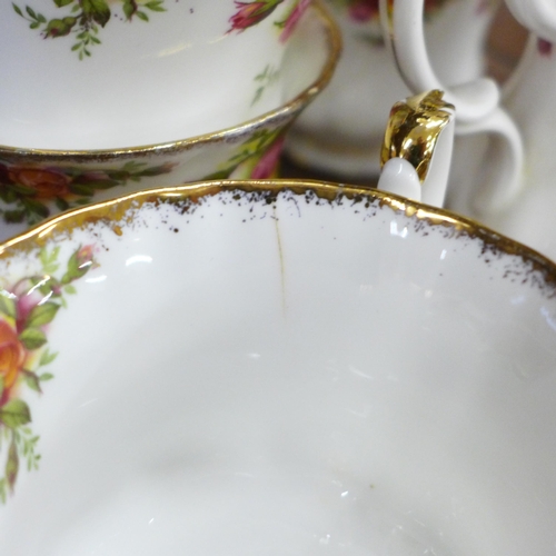 688 - Royal Albert Old Country Roses; seven cups and saucers, five tea plates, bread and butter plate, cre... 