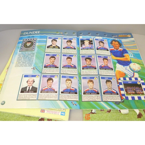 690 - Two 1977-78 Soccer Star sticker albums and two Panini 89 albums