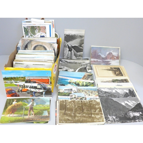 691 - Postcards; a box of postcards, vintage to modern