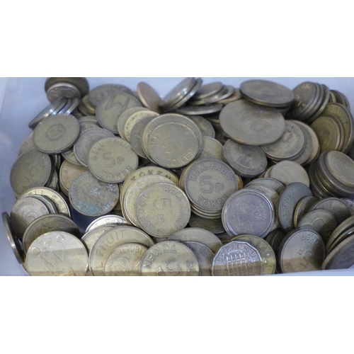 695 - Five tubs of foreign coins and gaming tokens, Bell Fruit and Gemini, 5.041kg