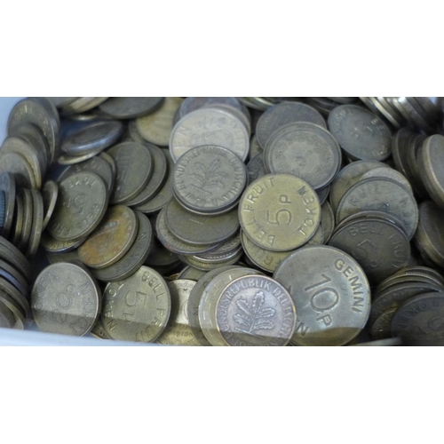 695 - Five tubs of foreign coins and gaming tokens, Bell Fruit and Gemini, 5.041kg