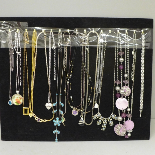 696 - Eighteen necklaces and pendants and chains