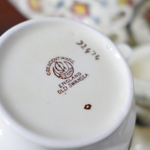 697 - A Crescent ware tea set, six setting, with teapot, cream and sugar and bread and butter plate **PLEA... 